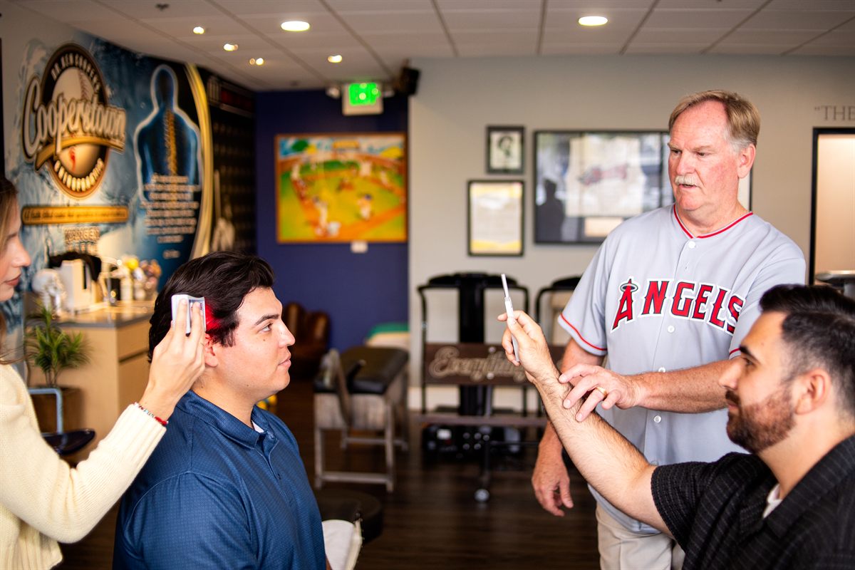 Dr. Ken Cooper, D.C., teaching the Concussion CPR treatment protocol to providers in his clinic